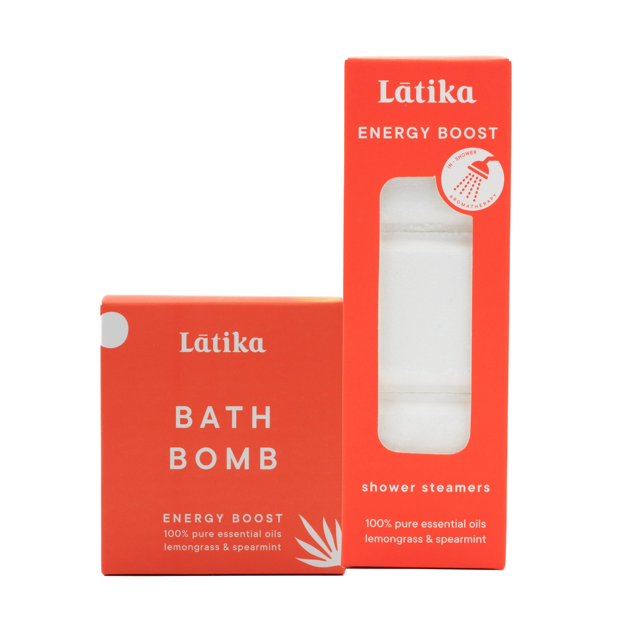 Two orange boxes of Latika energy boost bath bomb and shower steamers on a white background
