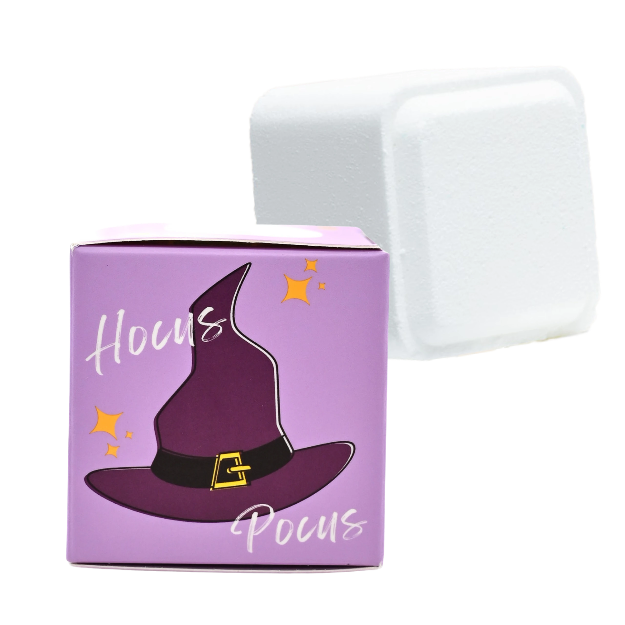 White shower steamer with a purple packaging box featuring a witch hat design for Halloween.
