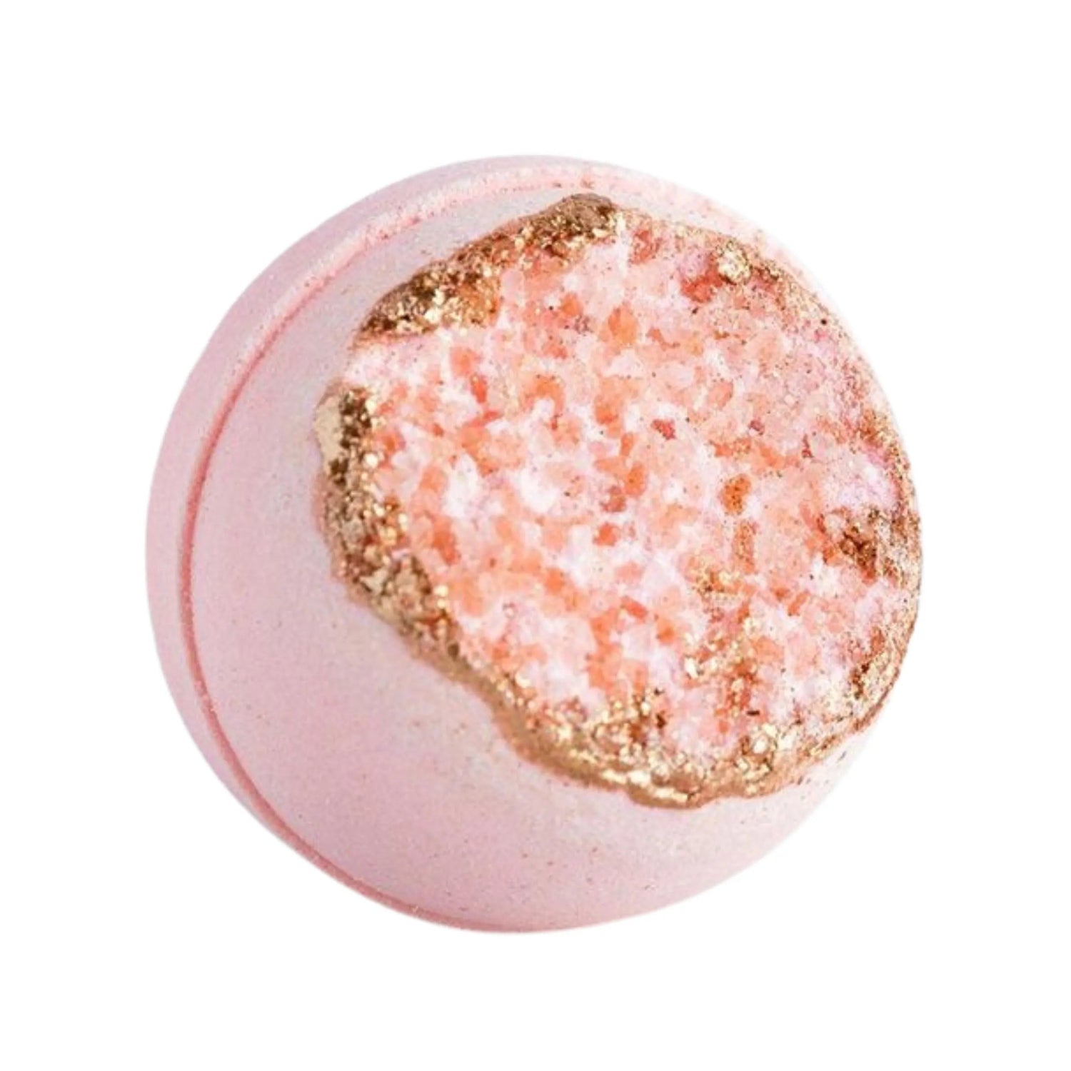 Pink bath bomb with gold glitter on a white background