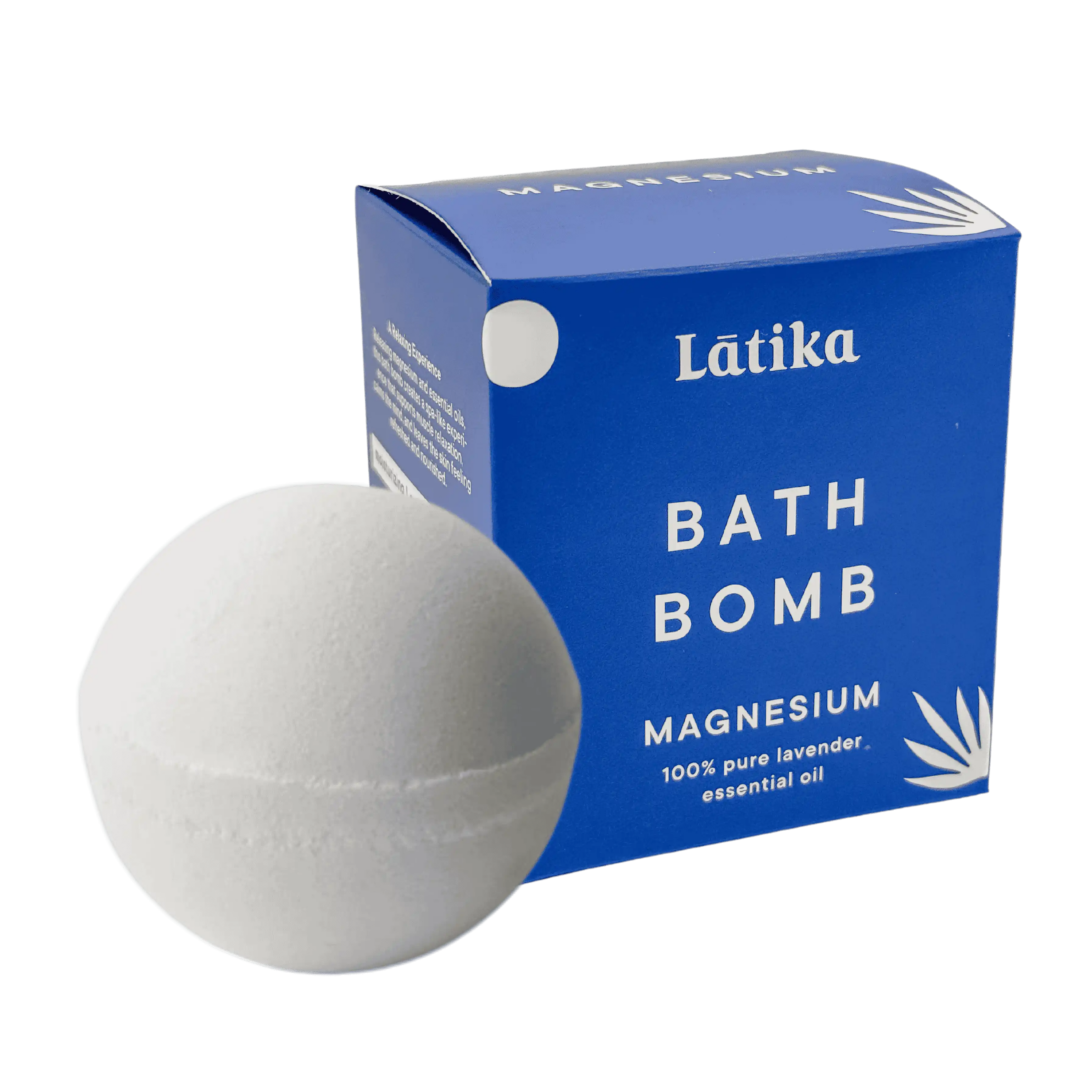 magnesium infused bath bomb next to its blue packaging with &