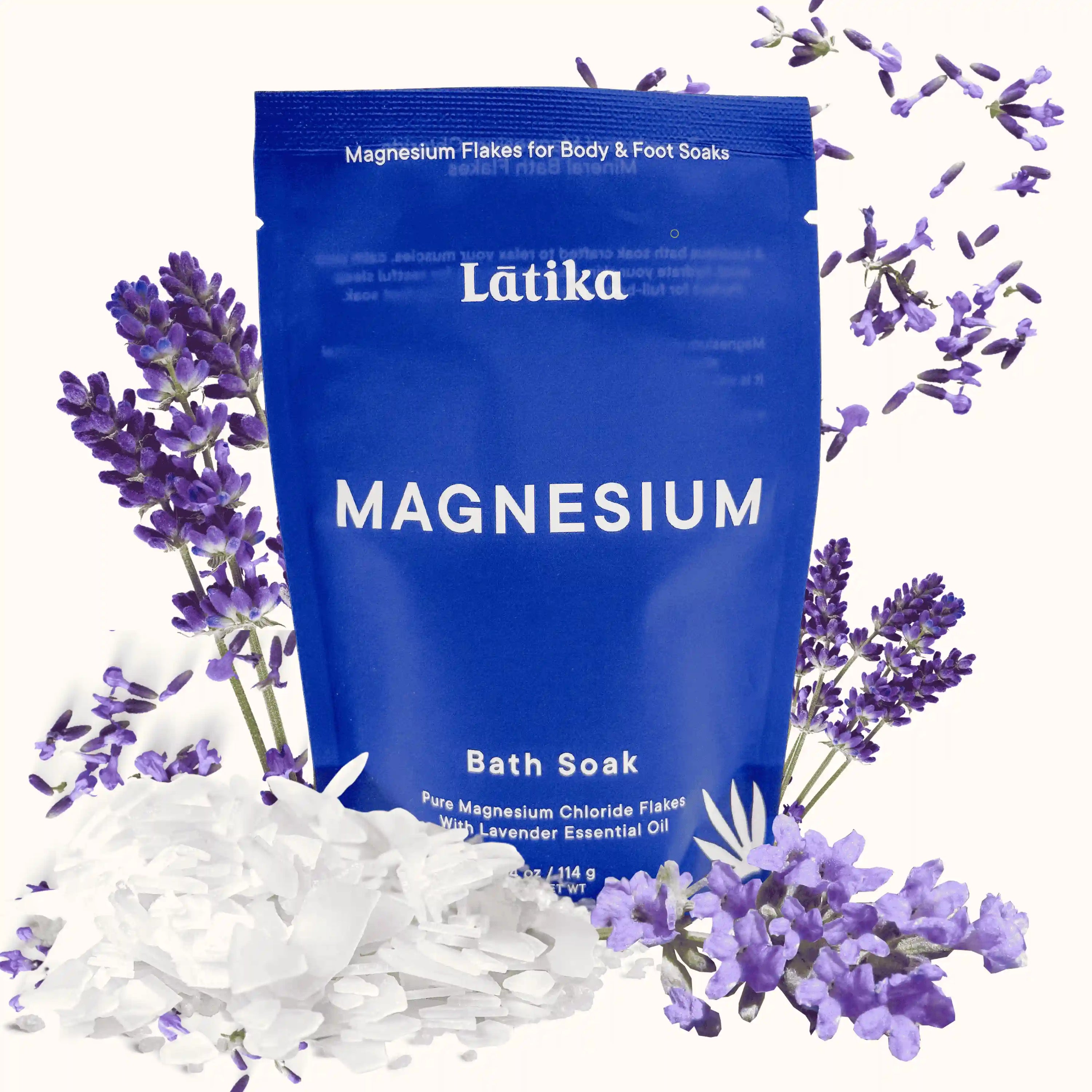 Blue package of Latika magnesium bath soak with lavender flowers on a white background