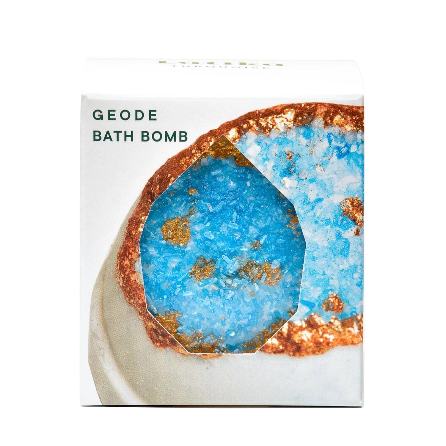 Geode bath bomb packaging with blue interior and gold specks on a white background