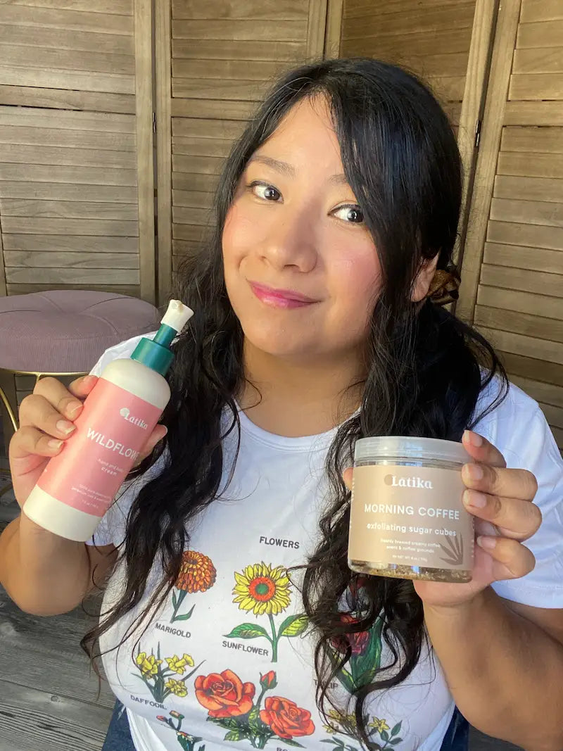 Person holding a bottle and a jar with products