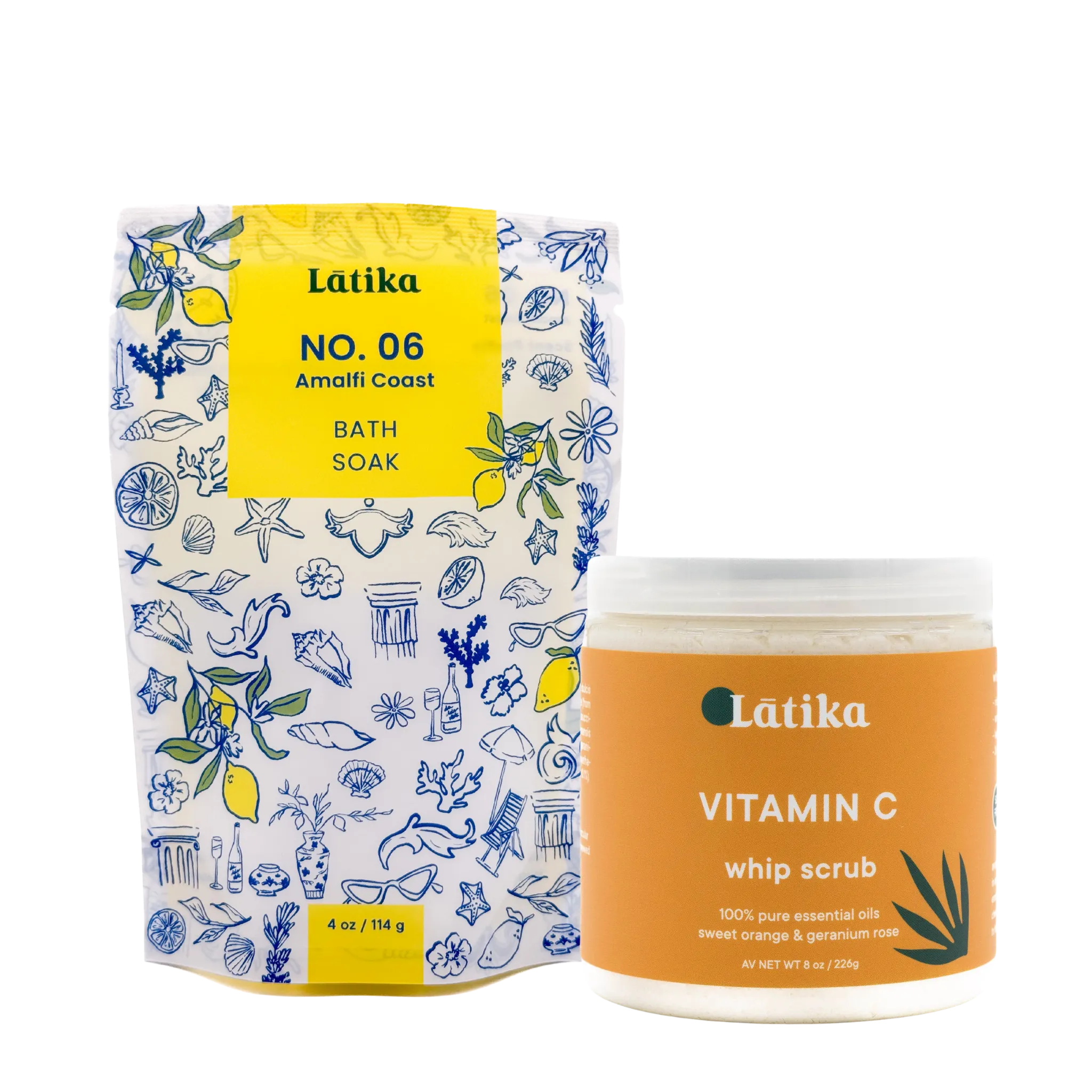 Latika bath soak package and vitamin C whip scrub on a white background