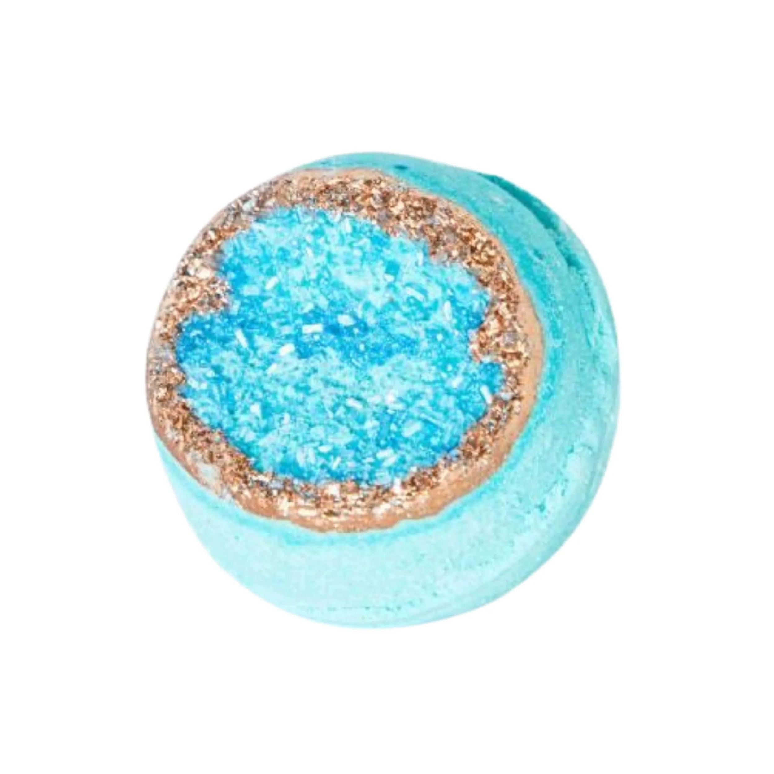 Turquoise-colored object with a glittery center on a white background  