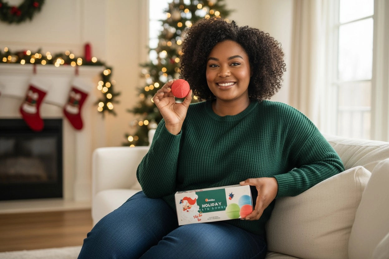Woman holding a box of Hallmark cards in a festive living room with Christmas decorations.