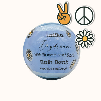 Blue bath bomb labeled &