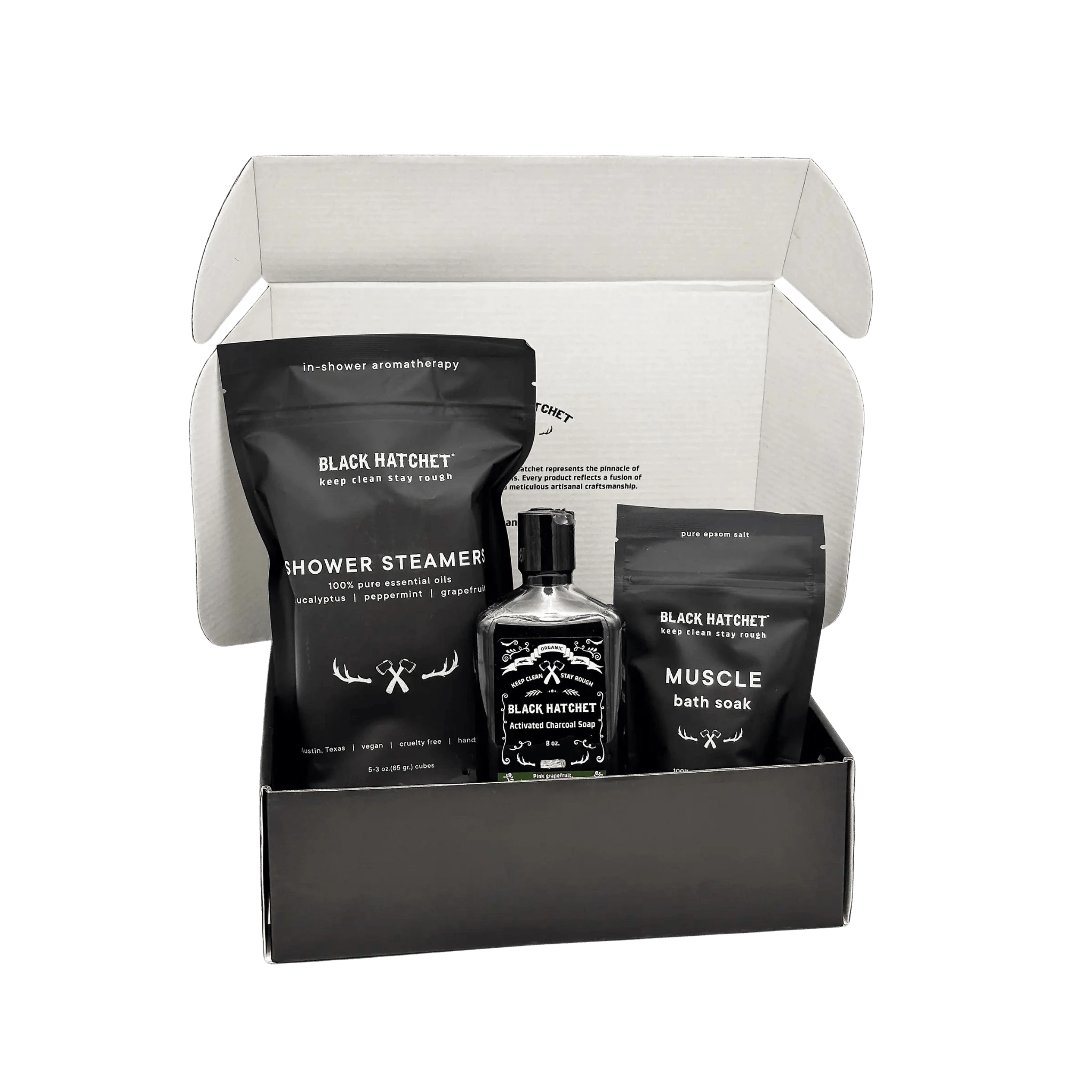 Black Hatchet product set, including a shower steamer, bottle, and bath soap in a box. gift for men.