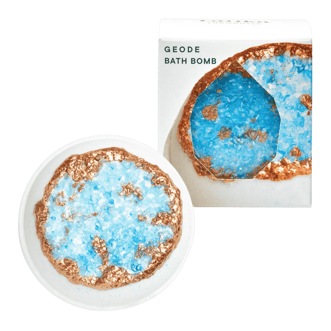 A geode bath bomb with a turquoise center and gold accents on a white background, alongside a depiction of the bath bomb being used in a bath tub.