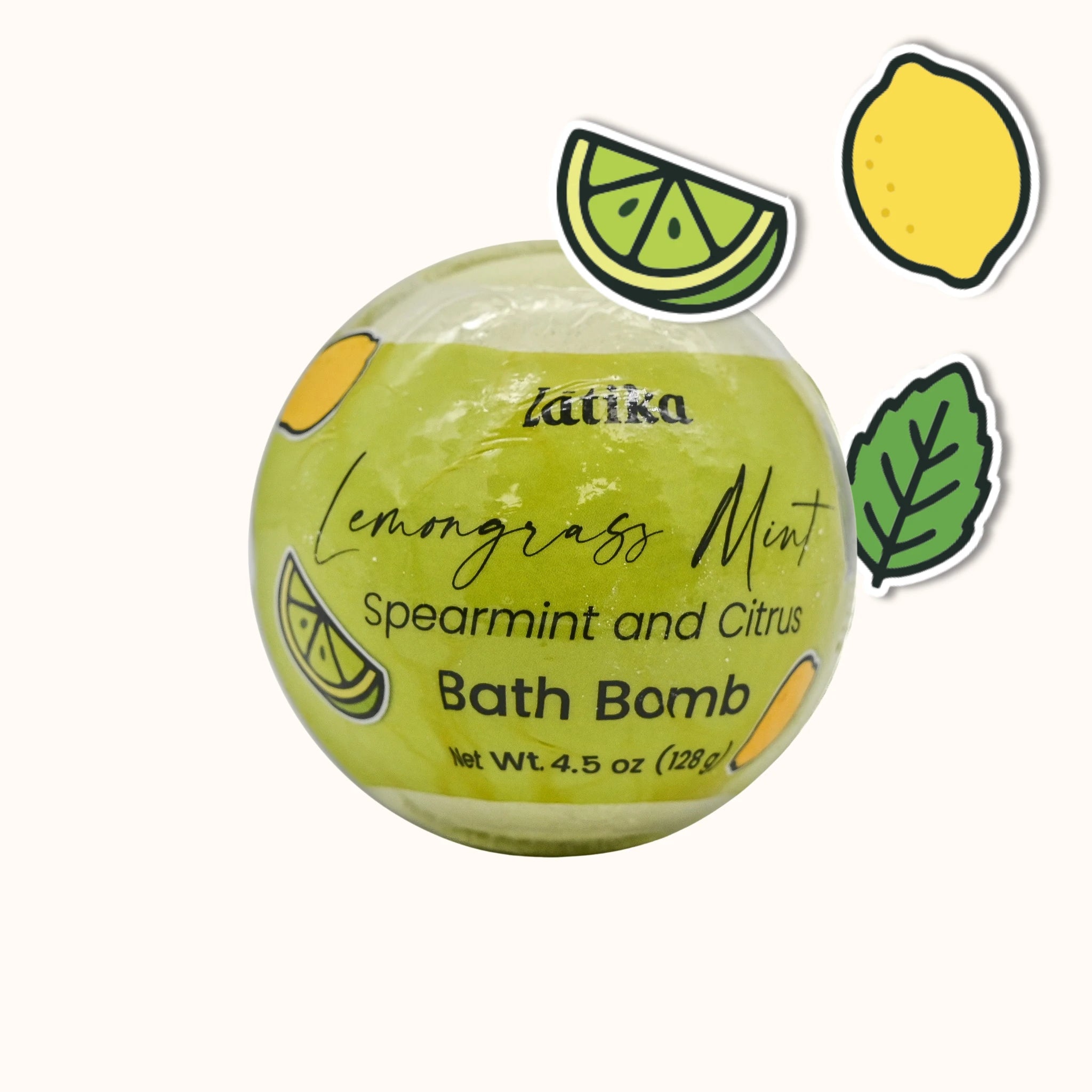 Lemongrass mint bath bomb with decorative elements on a white background
