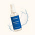 Bottle of Latika magnesium body oil with a blue label on a white background