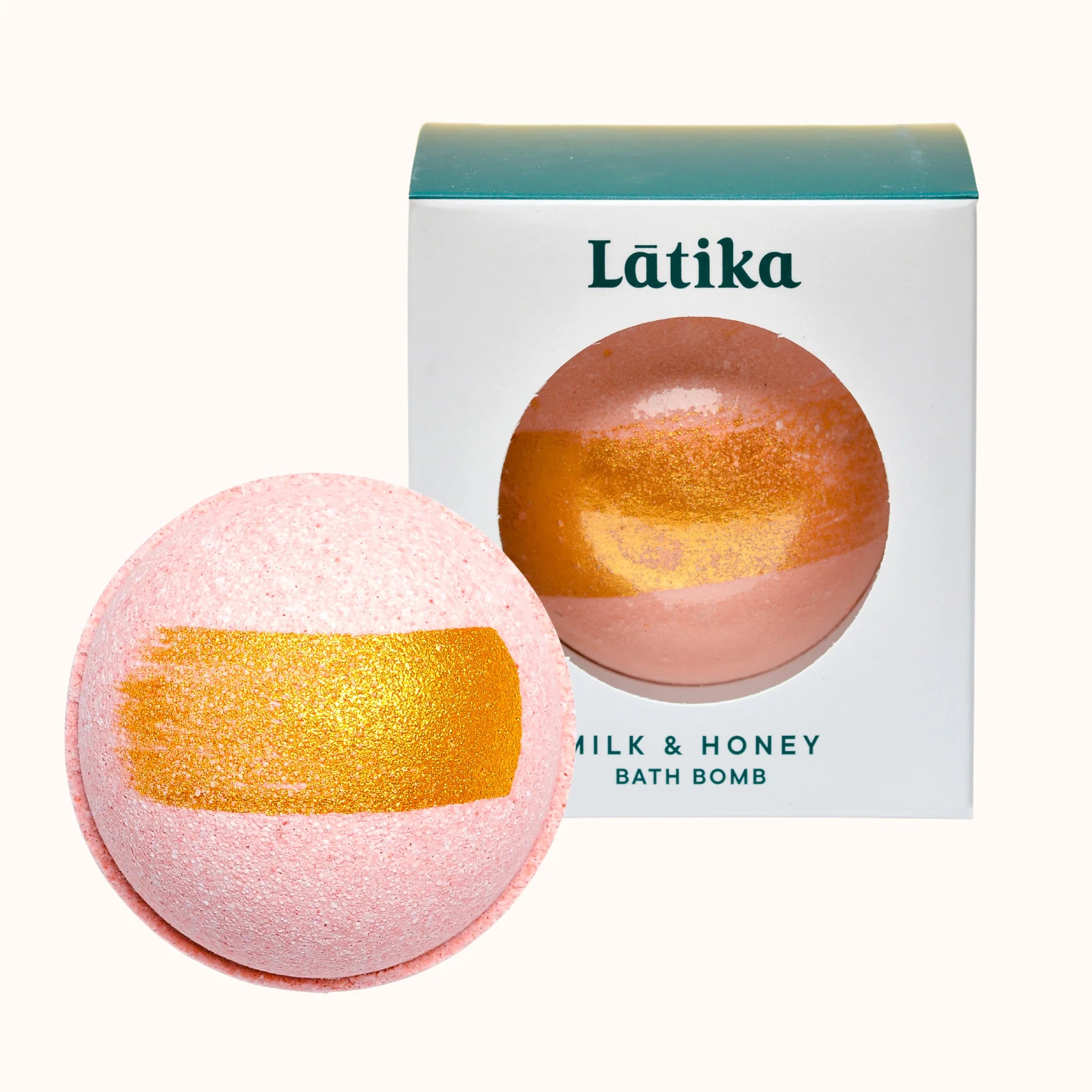 Pink and gold bath bomb with &