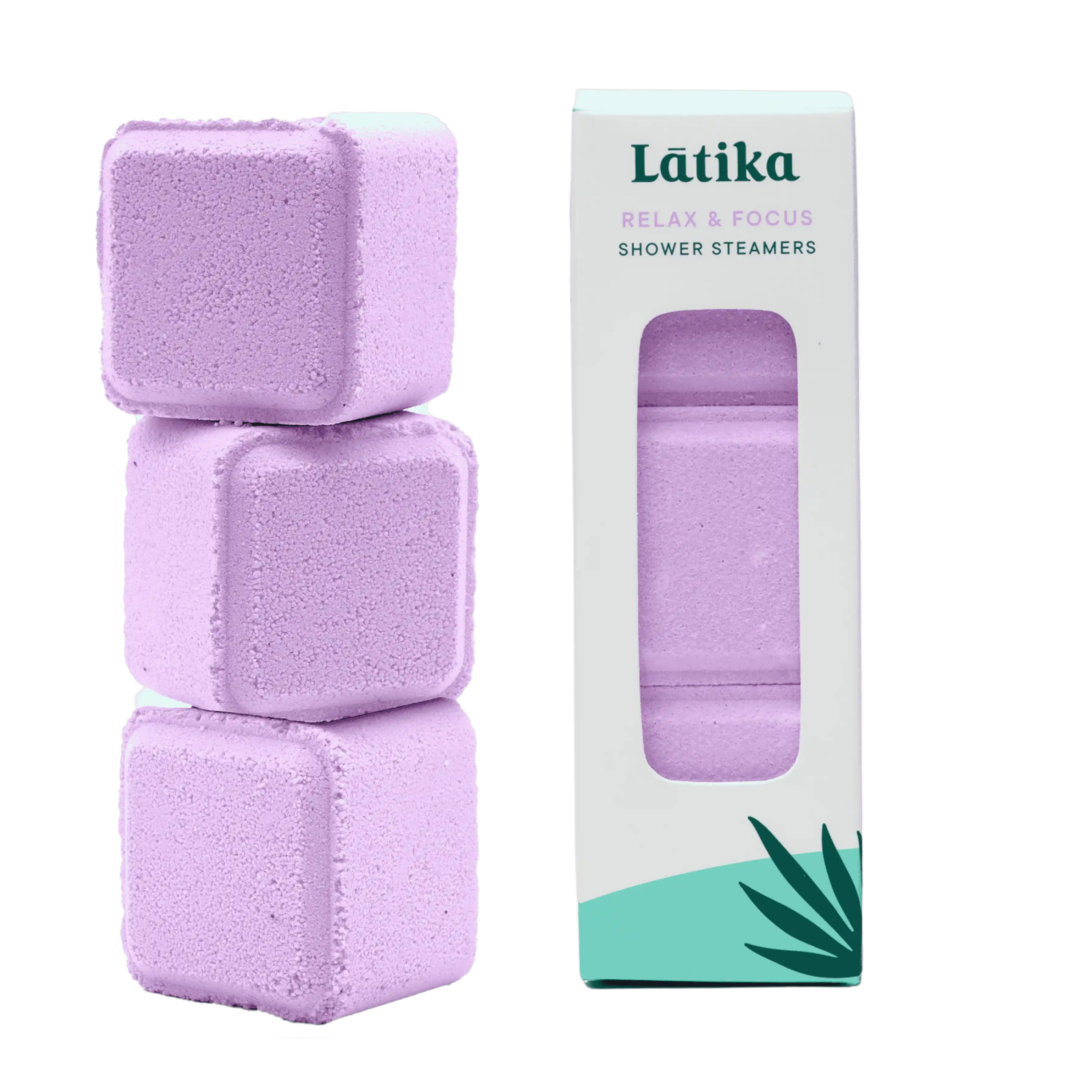 Three purple shower steamers stacked with their packaging relax and focus essential oils blend