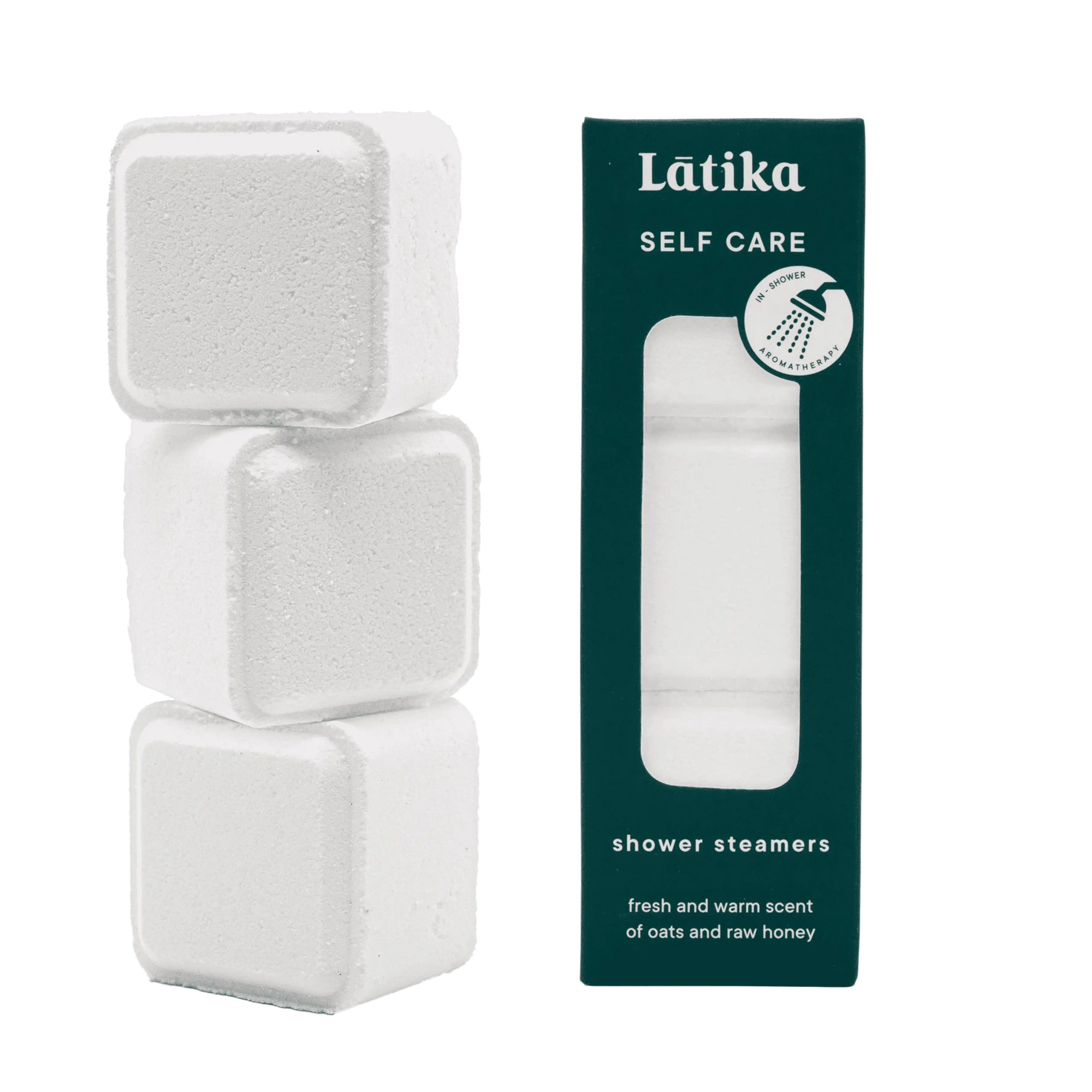 Three shower steamers with dark green box for self care